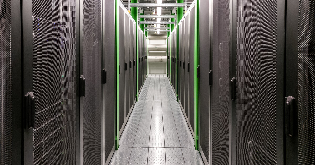 Data center server-room corridor where Googlebot crawls site infrastructure